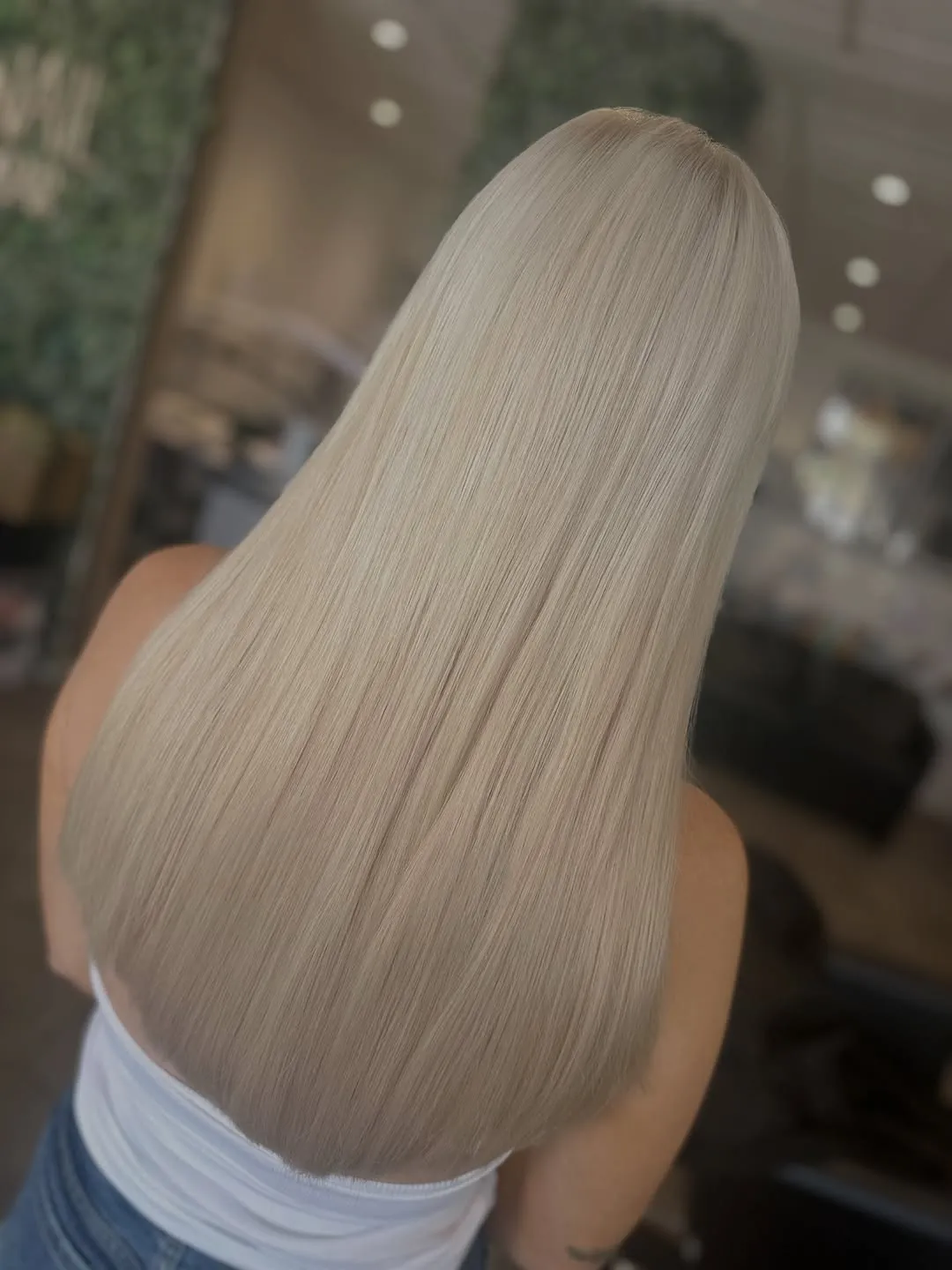 Long, glossy ice-blonde colour and blow dry by Autumn Rose Hair & Beauty