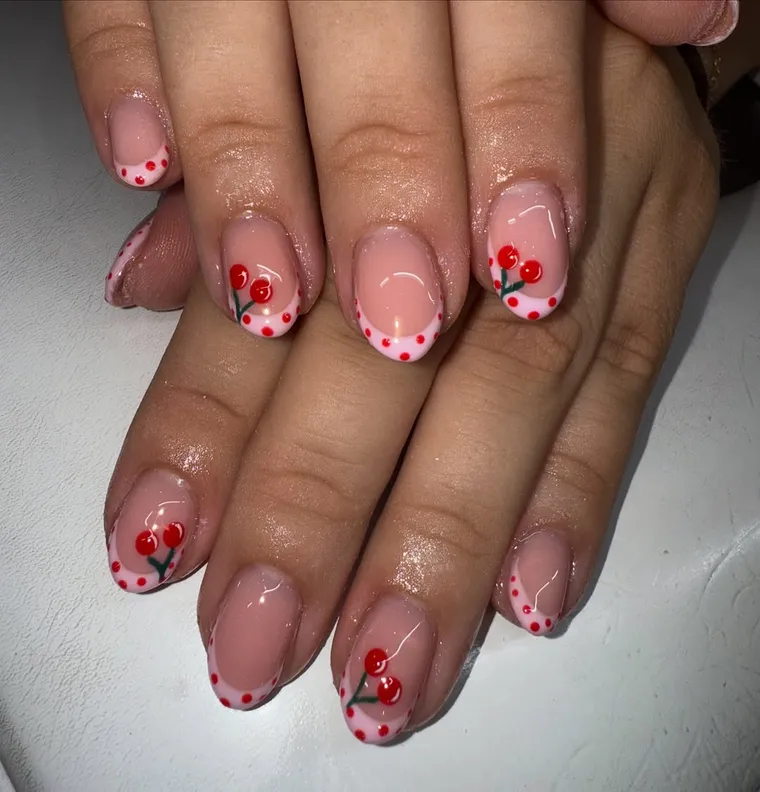 Cherry-red French nail tips by Autumn Rose Hair & Beauty