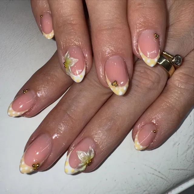 Summer-ball nails with gold detailing